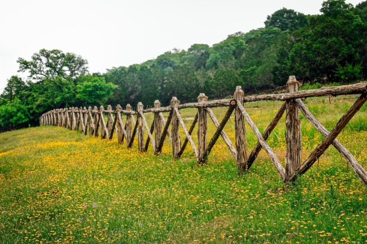 Wooden fence made from twigs.
